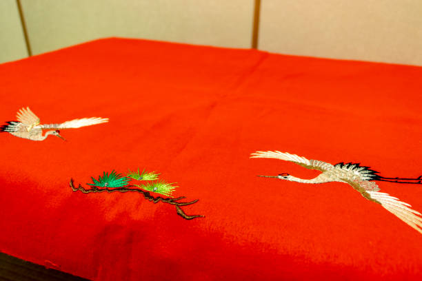 istock Table covered with Japanese traditional red felt 1290654523