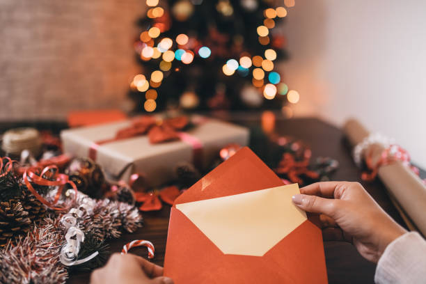 istock Finishing up a Christmas card 1290658955