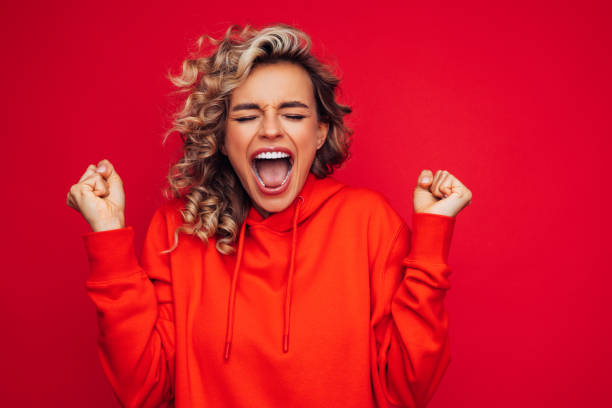 istock Young happy emotional girl 1290659357