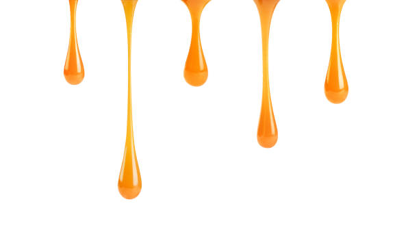 drops of caramel on white background