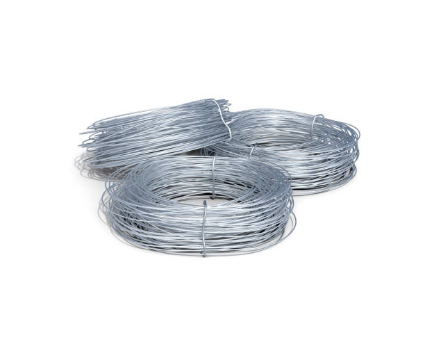 istock Three aluminium rolls of wire on white background, 3d illustration 1290665999