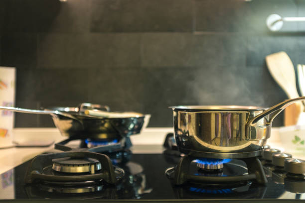 istock pots on the stove 1290666258