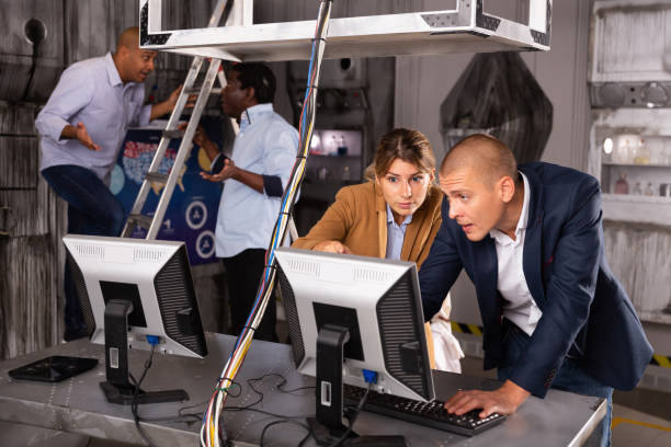 istock People are solving puzzles on computer in escape room stylized laboratory 1290666387