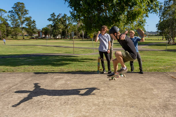 istock Skateboarder Being Cheered on By Friends 1290666705