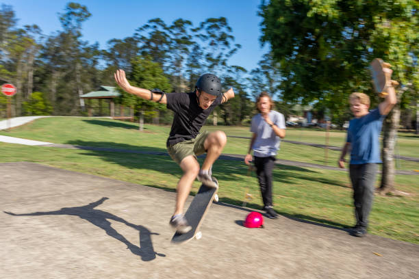 istock Skateboarder Being Cheered on By Friends 1290666713
