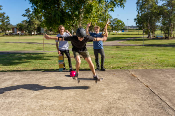 istock Skateboarder Being Cheered on By Friends 1290666732