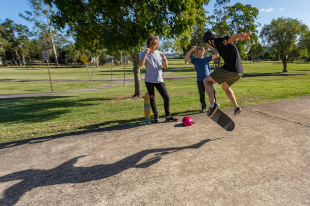 istock Skateboarder Being Cheered on By Friends 1290667442
