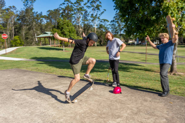 istock Skateboarder Being Cheered on By Friends 1290667443