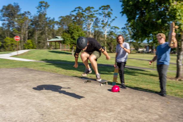 istock Skateboarder Being Cheered on By Friends 1290667449