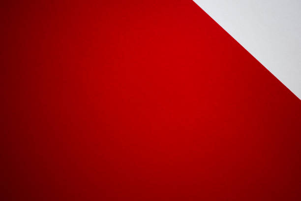 istock Red and white blank clean colored paper background 1290667544