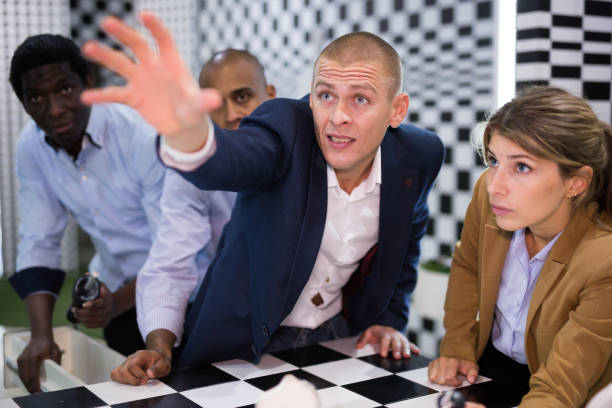 istock American man in quest room with colleagues 1290667918