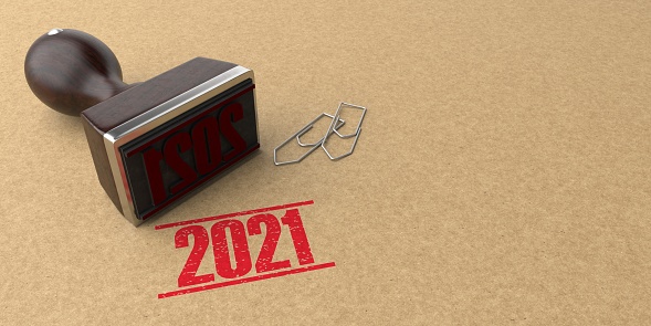 Stamp with the numbers 2021 on the brown cardboard. 3d illustration.