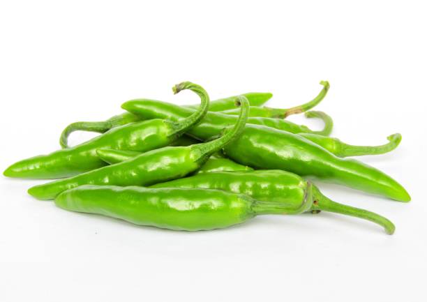istock Green chili pepper isolated on white background 1290674506