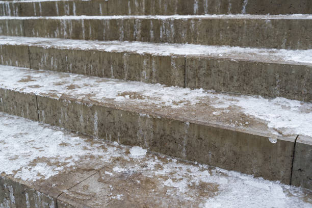 istock Ice on the stair steps is a hazard to pedestrian traffic. 1290676914