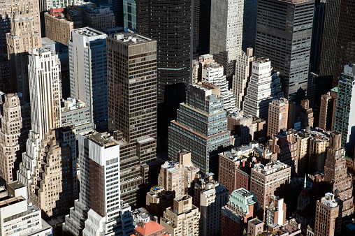 Detailed aerial shot of famous New York skyscrapers, impressive vertical architecture and real estate portfolio, headquarters of the most iconic businesses and brands in the world, Manhattan, NYC, USA.