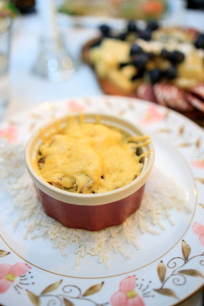 istock Chicken and cheese julienne in a cocotte-ramequin on the festive table 1290678766