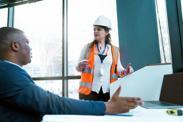 istock Civil engineer discussing with male architect 1290679839