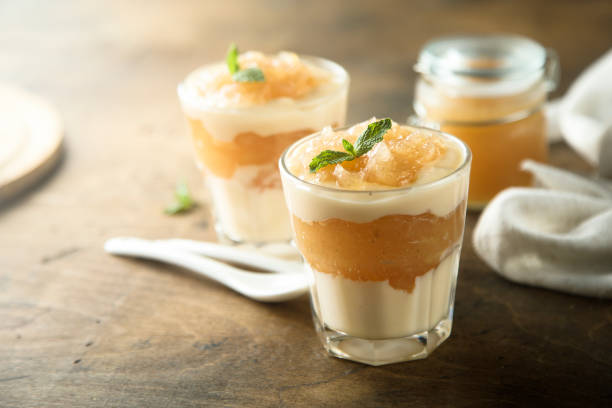 Apple dessert Homemade apple dessert with custard compote photos stock pictures, royalty-free photos & images