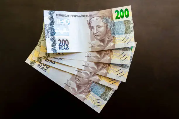 Be rich with money in Brazil. 200 Brazilian banknotes Reaís Real R$ BRL.