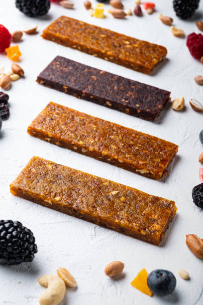 istock Fruit berry and nut energy bars, healthy snack, on white background 1290680780