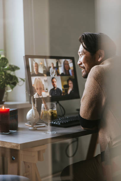 istock Happy asian man at virtual Christmas party 1290680857
