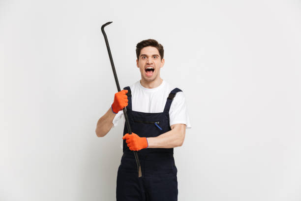 istock Angry male builder in gloves screaming and looking at camera 1290683481