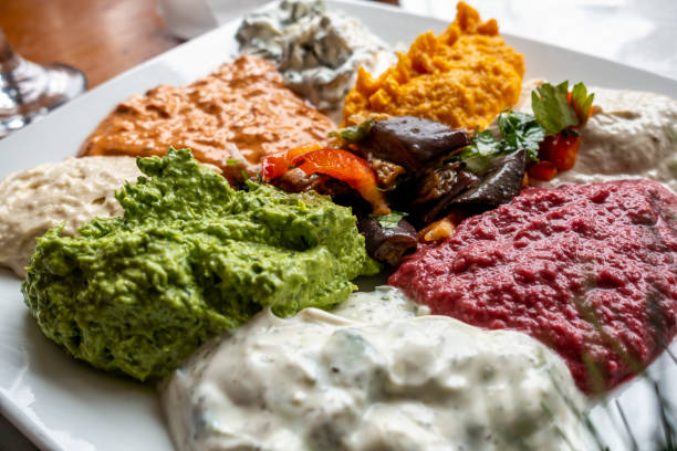 istock Close-up of various colorful Middle Eastern dips and spreads 1290683686