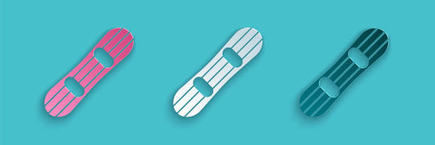 istock Paper cut Snowboard icon isolated on blue background. Snowboarding board icon. Extreme sport. Sport equipment. Paper art style. Vector 1290685359