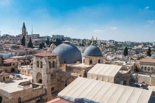 Aerial view of the old city with blue sky of Jerusalem. Christian quarter and dome of  the Church of the Holy Sepulchre. View from the Lutheran Church of the Redeemer. stock photo