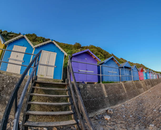 istock Wide angle view of Cromer beach huts 1290688550