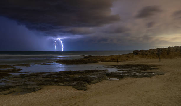 istock Lightning storm om Mediterranean Sea 1290693602