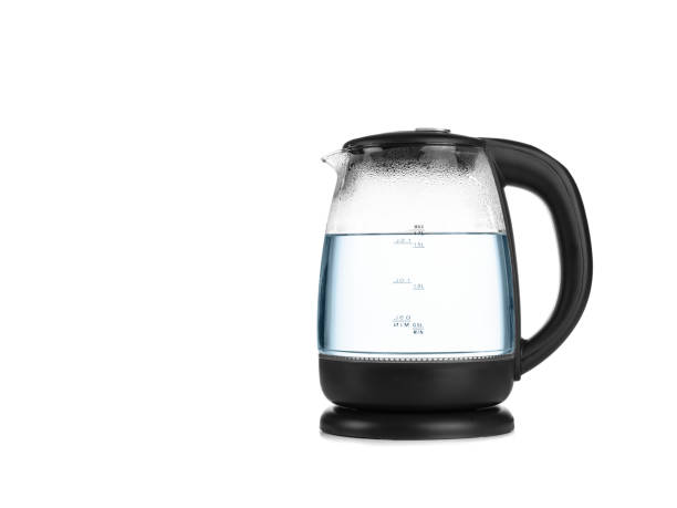 istock Glass kettle isolated on white background 1290695733