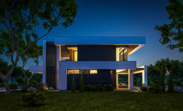 istock 3d rendering of modern house in luxurious style in night 1290700571