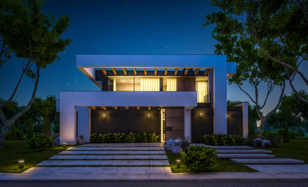 istock 3d rendering of modern house in luxurious style in night 1290700606