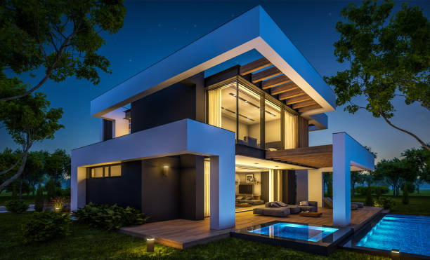 istock 3d rendering of modern house in luxurious style in night 1290700639