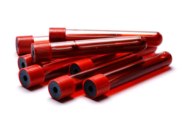 istock Test tubes with red plug isolated on white background 1290700859
