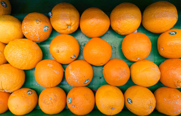 istock Fresh Oranges at the supermarket 1290702250
