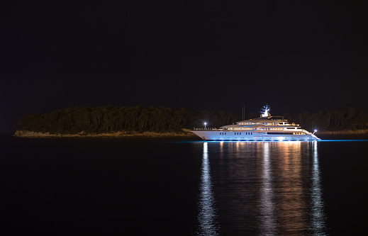 Night photo of a yacht in the Adriatic Sea near the island of Daksa in Dubrovnik area, Dalmatian coast