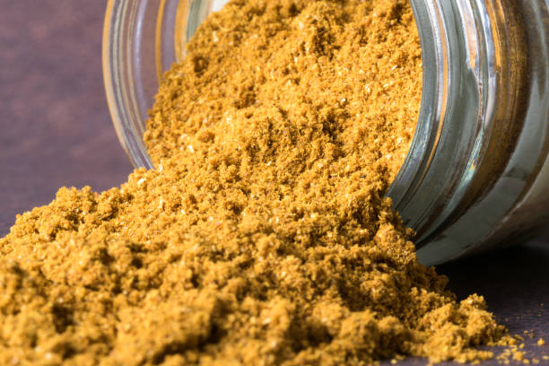 istock Ras El Hanout Spilled from a Spice Jar 1290705755