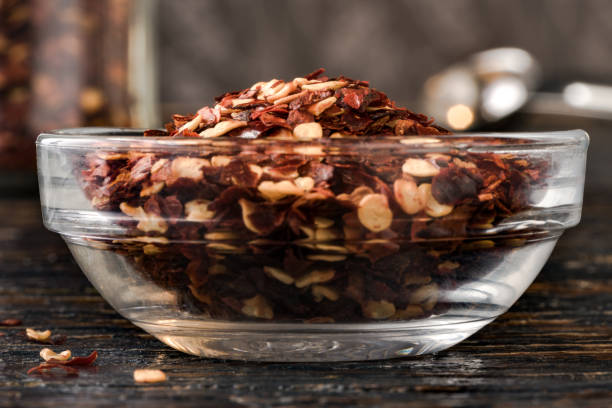 istock Red Pepper Flakes in a Bowl 1290706909