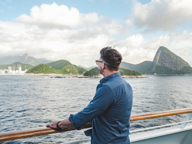 istock Fashionable man on the empty deck of a cruise liner 1290707330