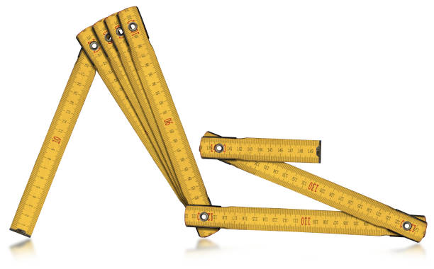 istock Yellow Old Wooden Folding Ruler Isolated on White Background 1290710101