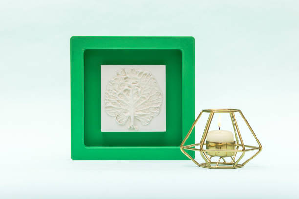 istock Stylish living room interior with botanical bas-relief cabbage leaf and statuette head of David for wall art. 3D plaster decor. Modern and luxury interior of room. 1290711362