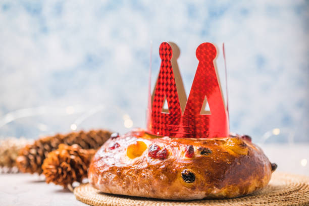 istock Rosca de reyes, spanish three kings cake eaten on epiphany day, on a gray rustic table 1290712708