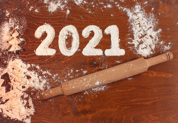 istock 2021 inscription made of flour 1290714260
