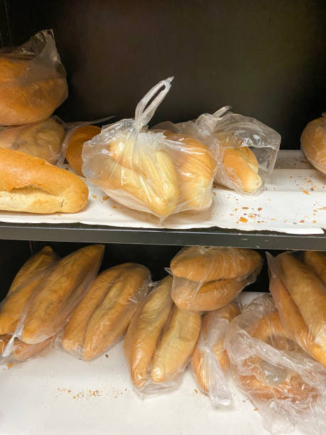 istock Hot baked breads in plastic bags 1290715317