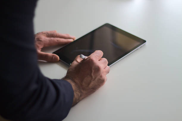 Business strategy analysis concept. Businessman using digital tablet and stylus pen,