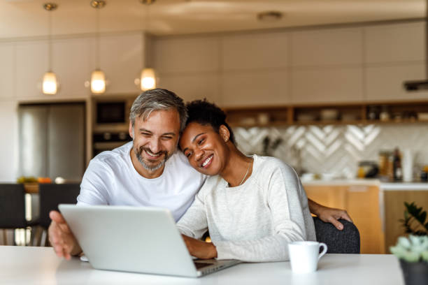 istock Enjoying together in their living room. 1290725304