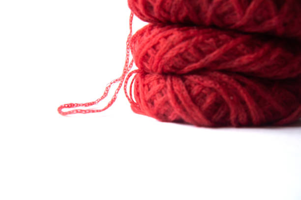 closeup red knitted woolen fabric texture background