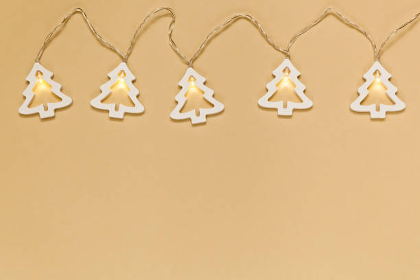 istock christmas garland on a beige background 1290726686